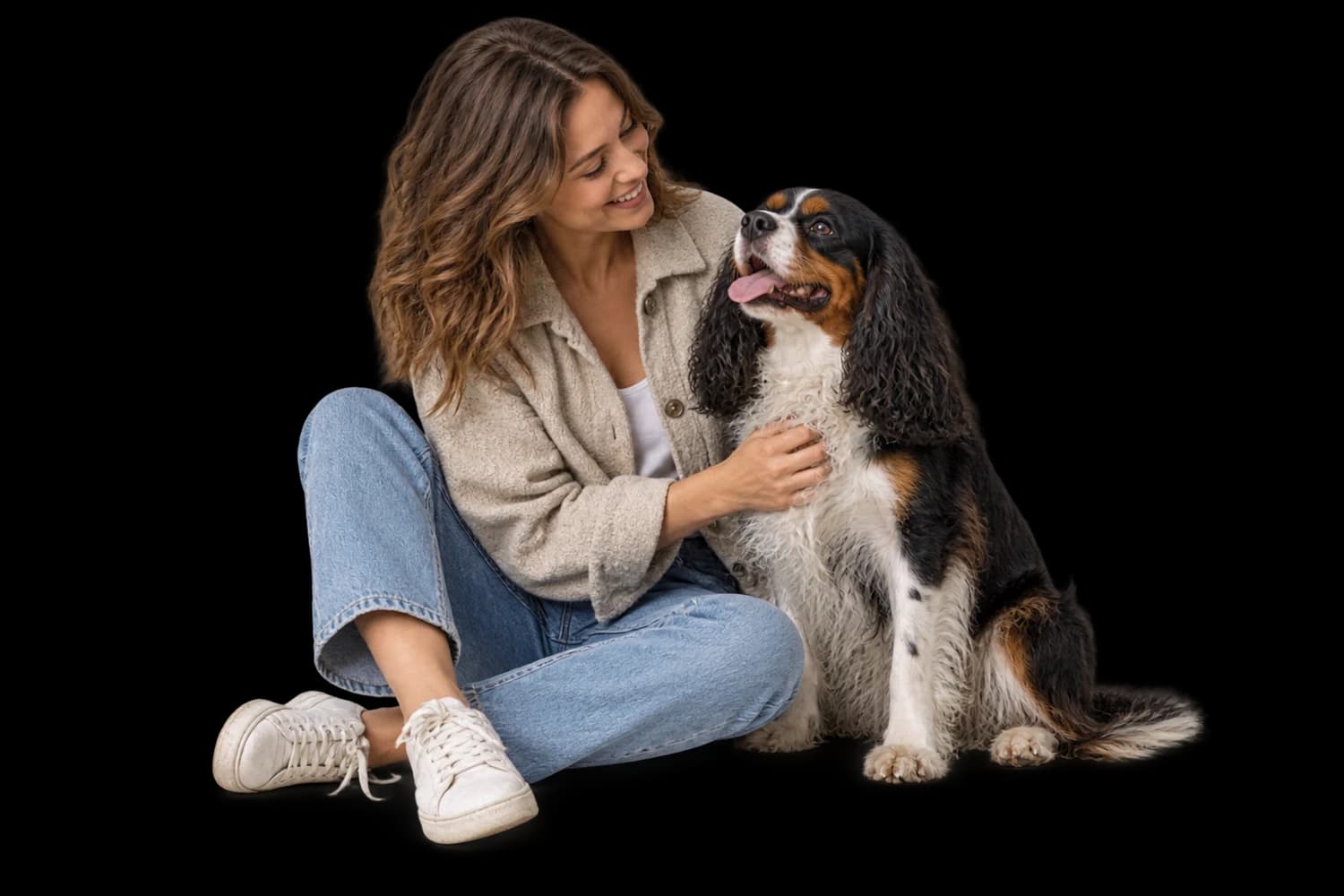 Illustration of a caregiver sitting beside a relaxed spaniel